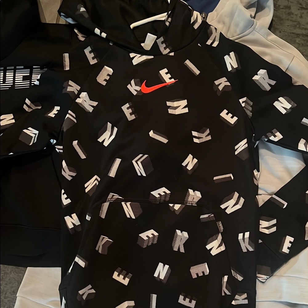 Nike Black Hoodie with Red Swoosh and White Logo